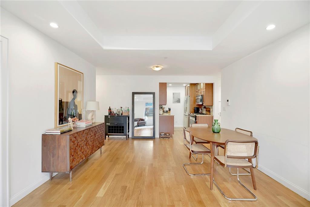 26 4th Street, Unit 2D Brooklyn, NY 11231 - Photo 9 of 26 a living room with furniture and a wooden floor