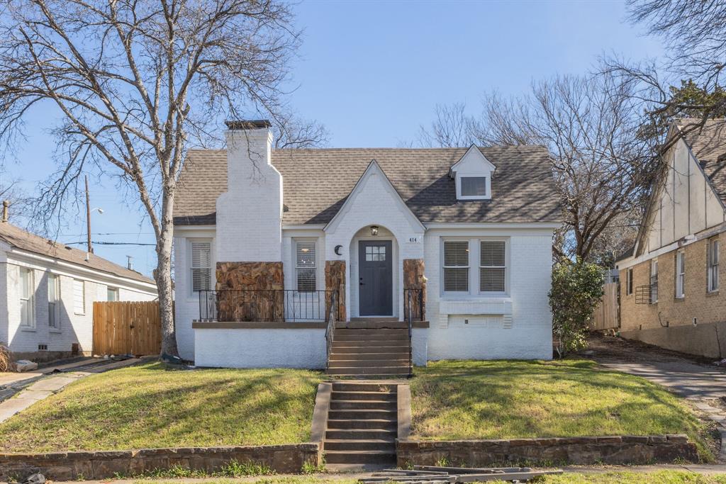 414 South Westmoreland Road Dallas, TX 75211 - Photo 1 of 1 a view of a house with a yard