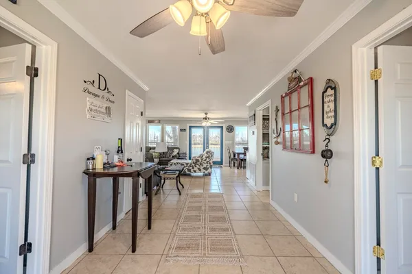 a lobby with furniture and rug