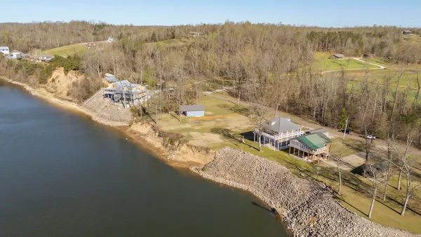 a view of a balcony with lake view and mountain view
