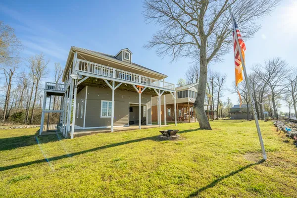 a view of a house with basketball court