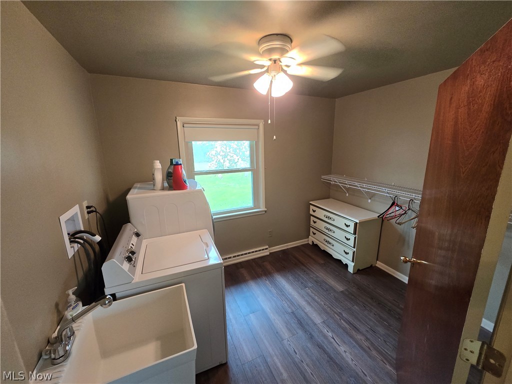 2550 Merria Road Stow, OH 44224 - Photo 22 of 22 Washroom with hookup for a washing machine, sink, dark hardwood / wood-style flooring, a baseboard heating unit, and ceiling fan