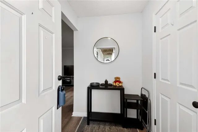 a view of dining room and wooden floor