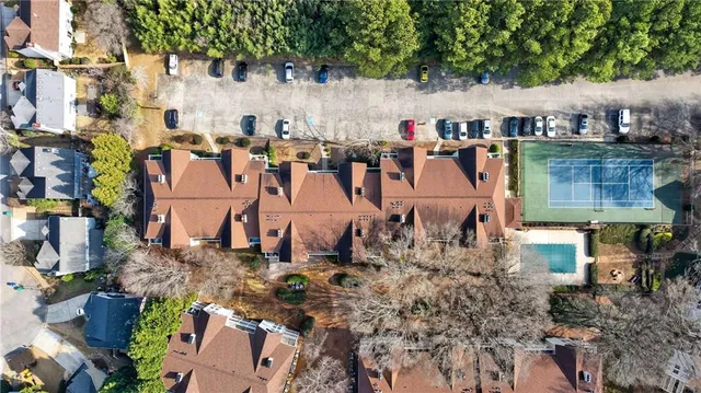 an aerial view of a building with outdoor space