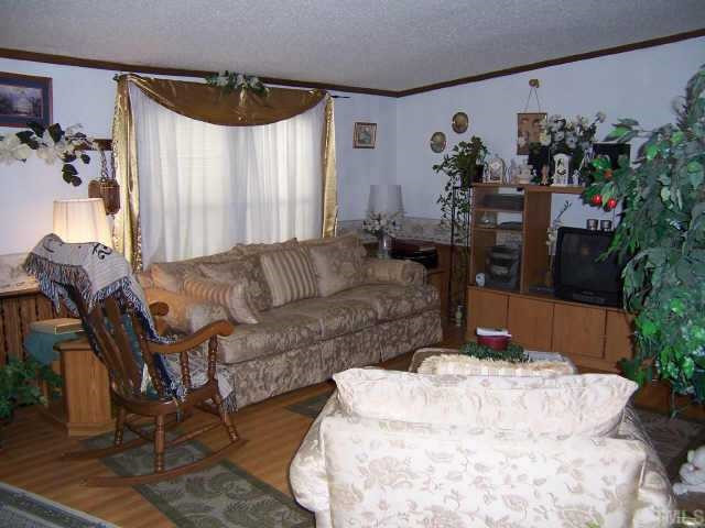Enter through the front door into the family room. Other