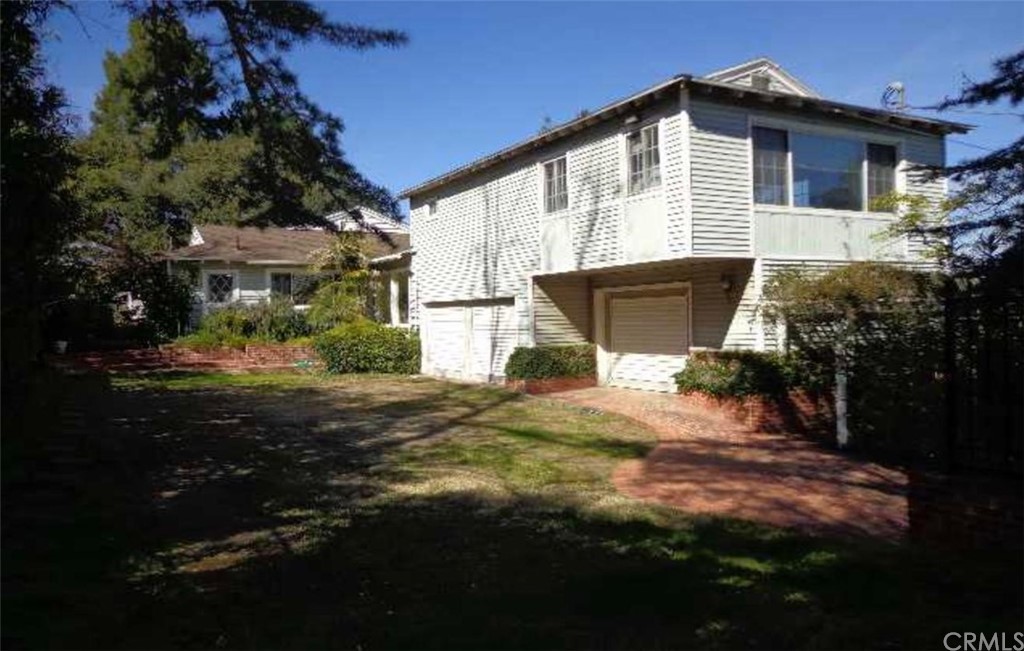 11919 Lockridge Road Studio City, CA 91604 - Photo 1 of 1 a view of house with outdoor space and garden