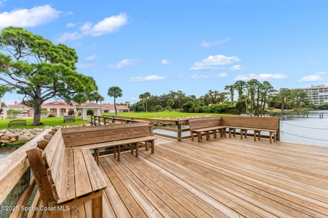 a view of a lake with houses with outdoor space