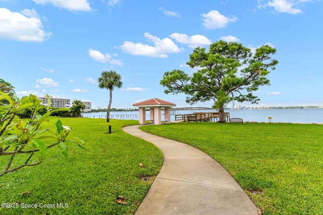 a view of a wooden floor and a lake view