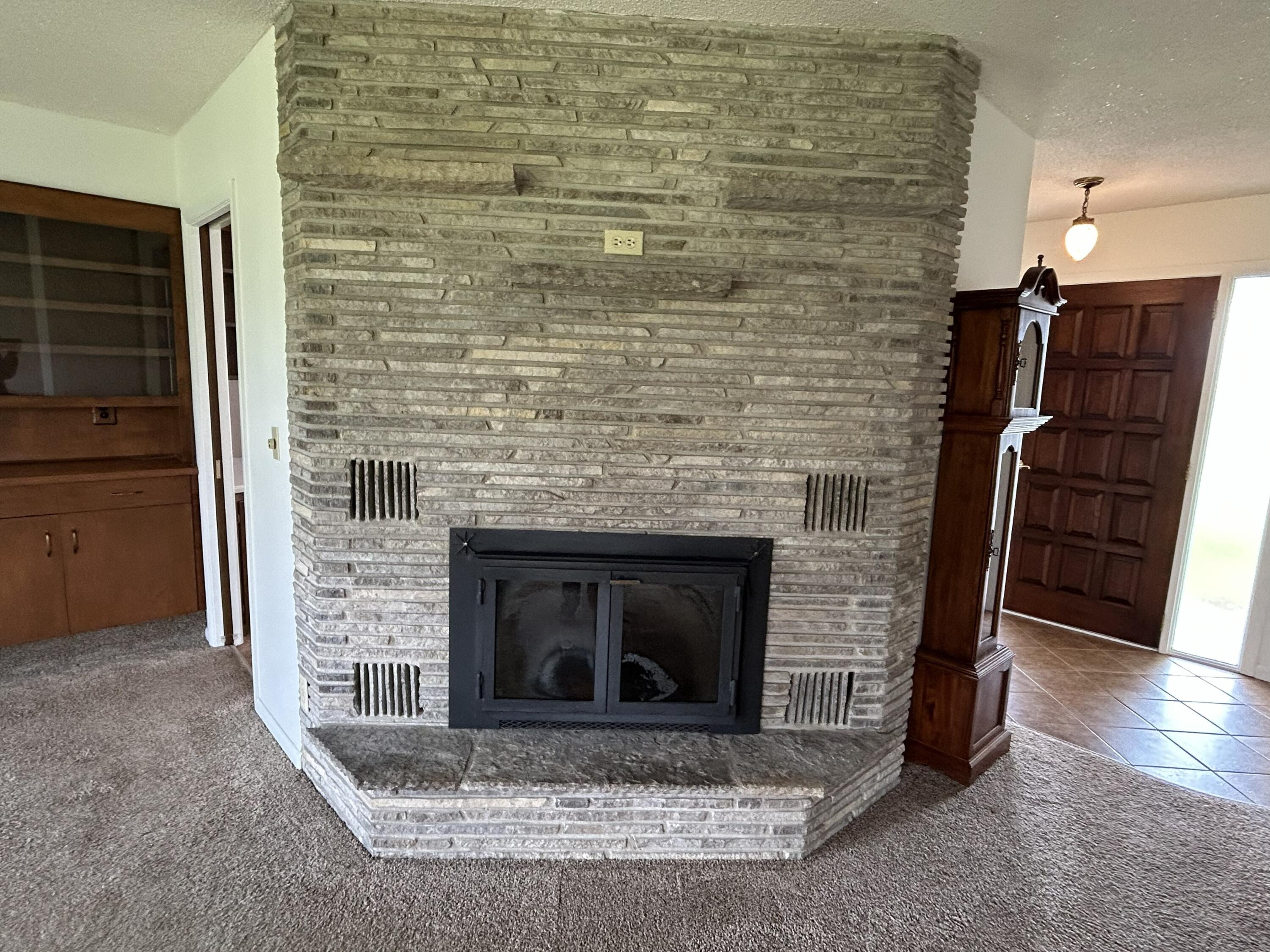 8887 Galbraith Road Cheboygan, MI 49721 - Photo 4 of 38 3 living fireplace