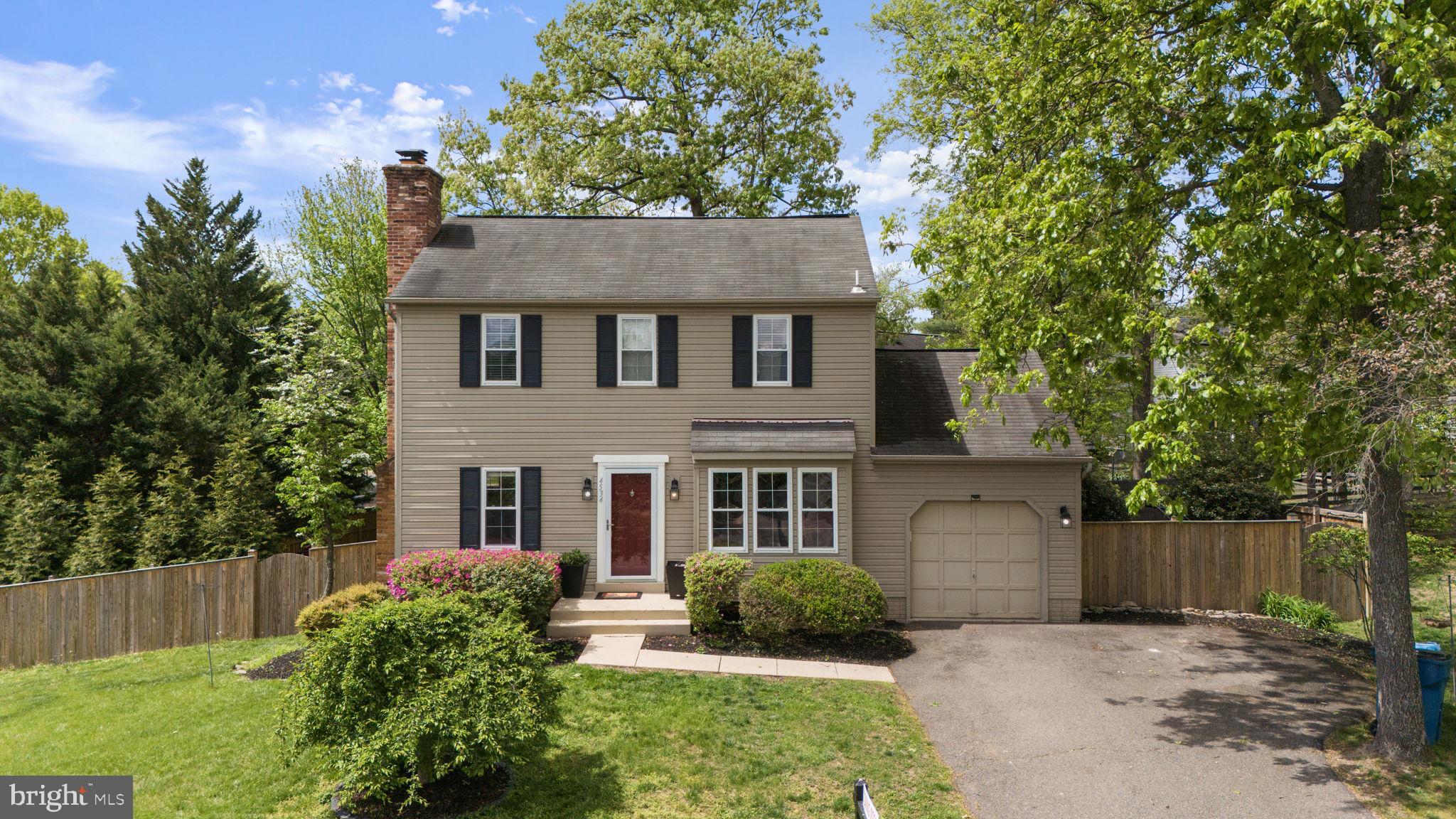 4534 Samuels Pine Road Chantilly, VA 20151 - Photo 1 of 1 front view of a house with a yard