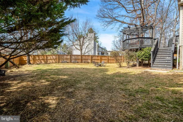 a view of yard covered with snow