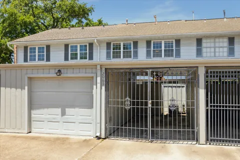 a view of a house with a door and a window