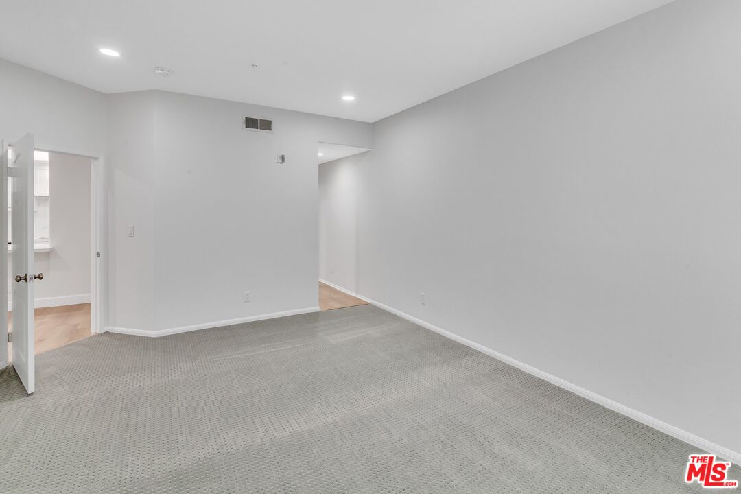 4477 Woodman Avenue, Unit 207 Sherman Oaks, CA 91423 - Photo 21 of 34 a view of an empty room