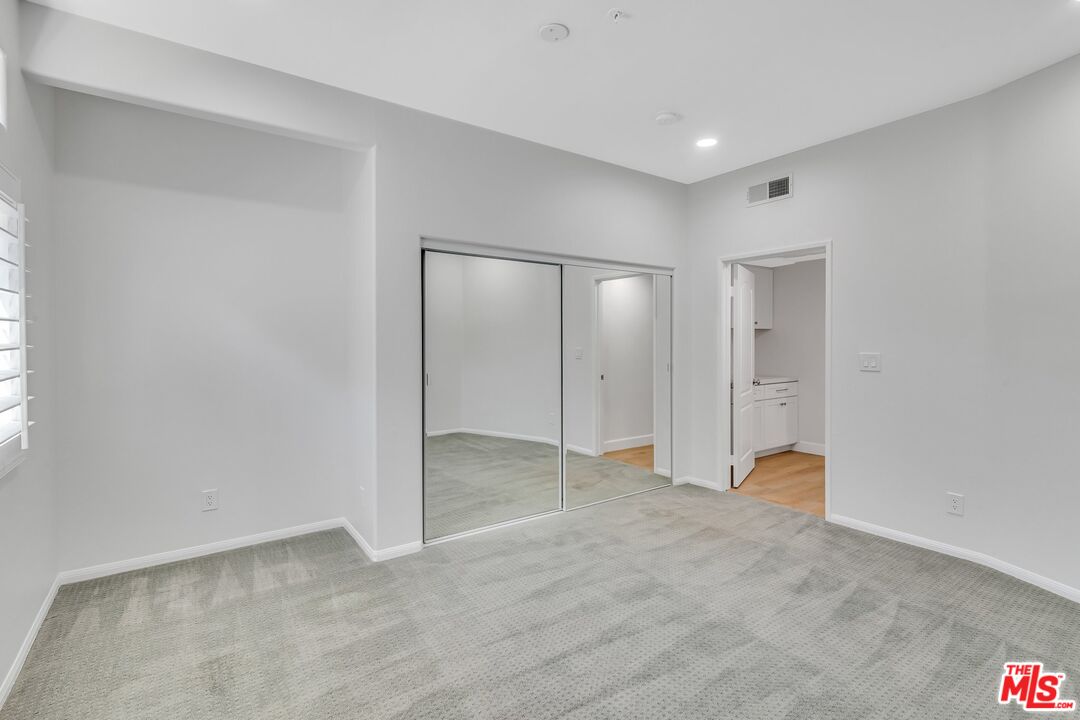 4477 Woodman Avenue, Unit 207 Sherman Oaks, CA 91423 - Photo 23 of 34 a view of an empty room