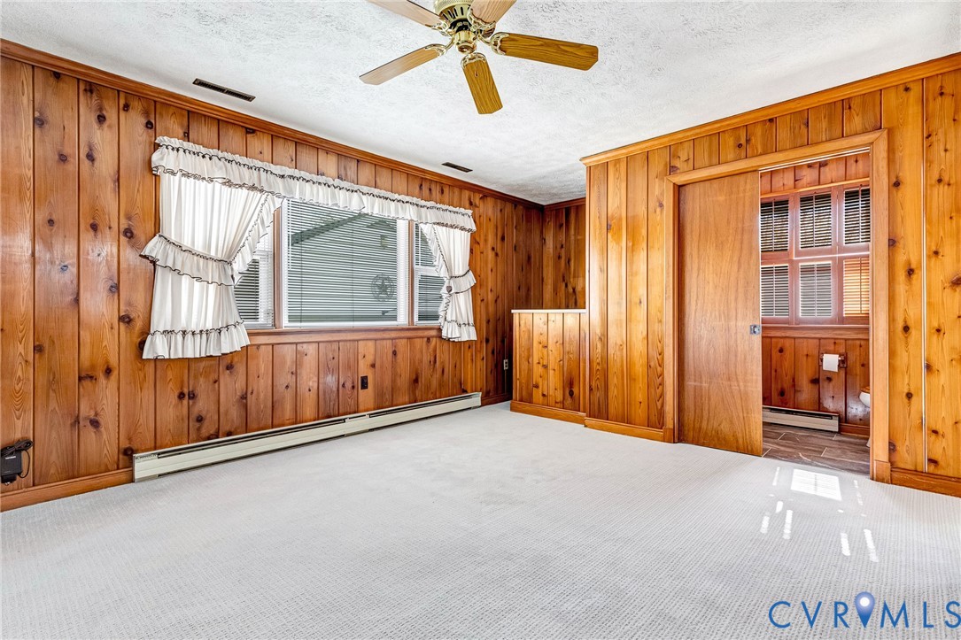 14 Medlock Road Sandston, VA 23150 - Photo 12 of 38 Paneled den with half bath and bar area