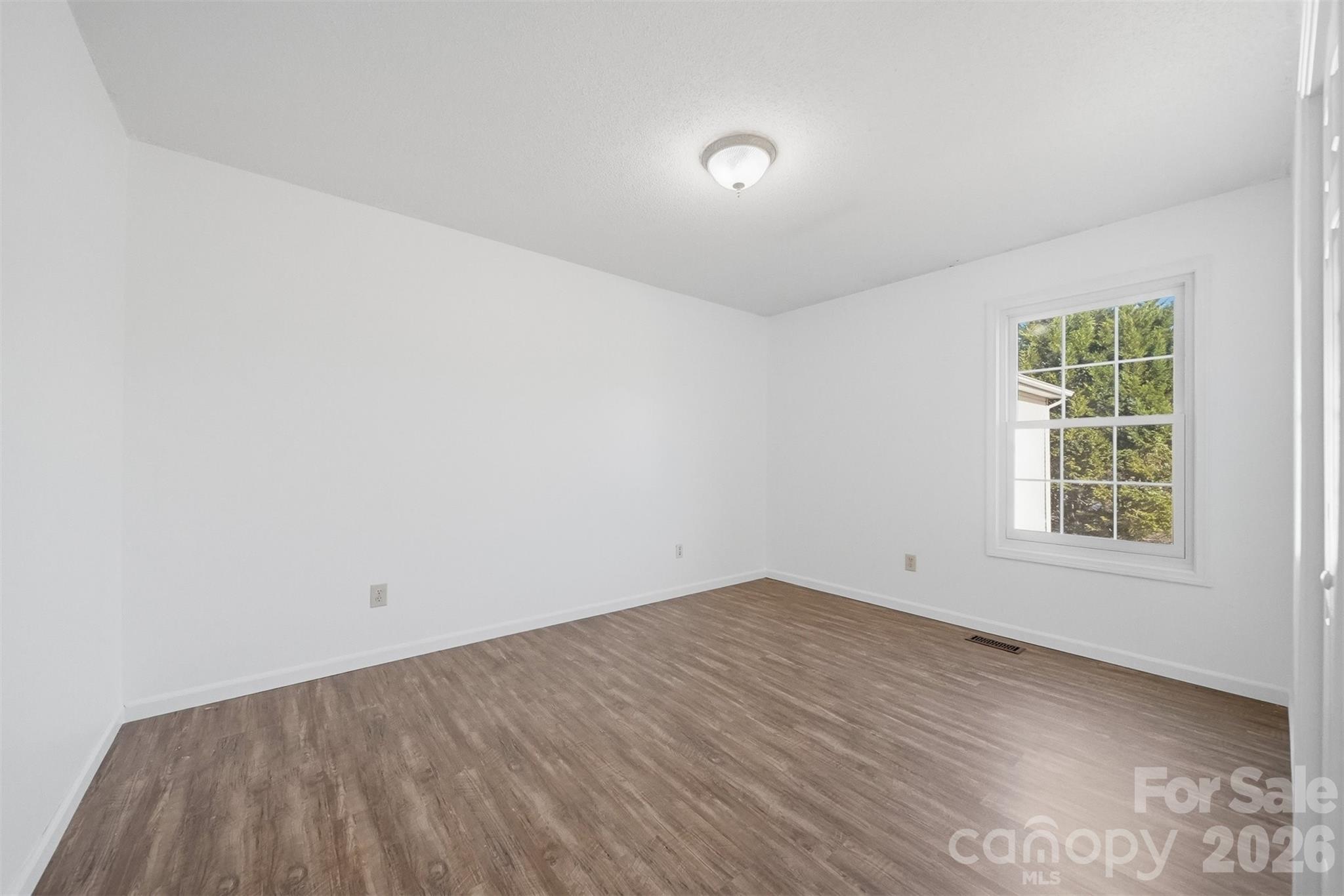 4771 Petra Mill Road Granite Falls, NC 28630 - Photo 33 of 46 an empty room with a window