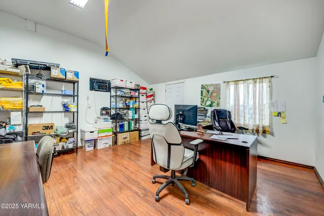 a view of a lake with a yard