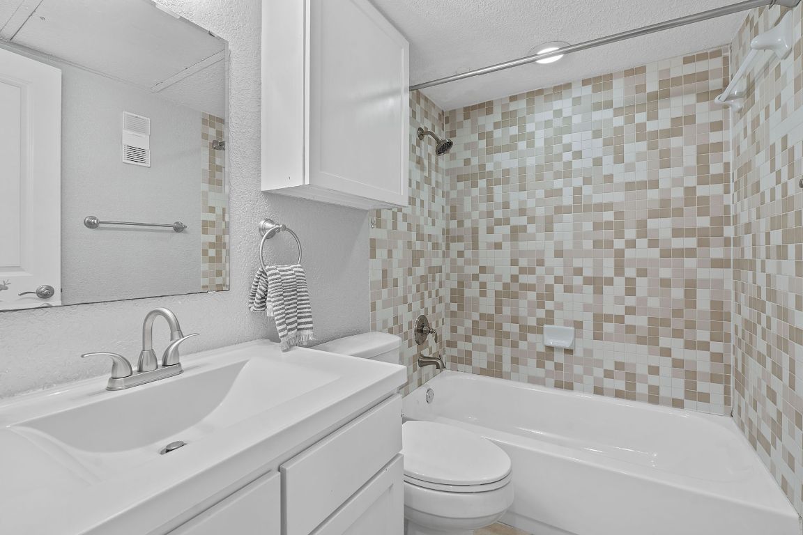 3204 Menchaca Road, Unit 303 Austin, TX 78704 - Photo 5 of 26 a bathroom with a sink toilet and shower