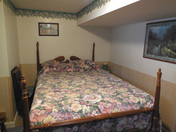 6 Wales Road Brimfield, MA 01010 - Photo 12 of 30 a bed sitting in a bedroom next to a window