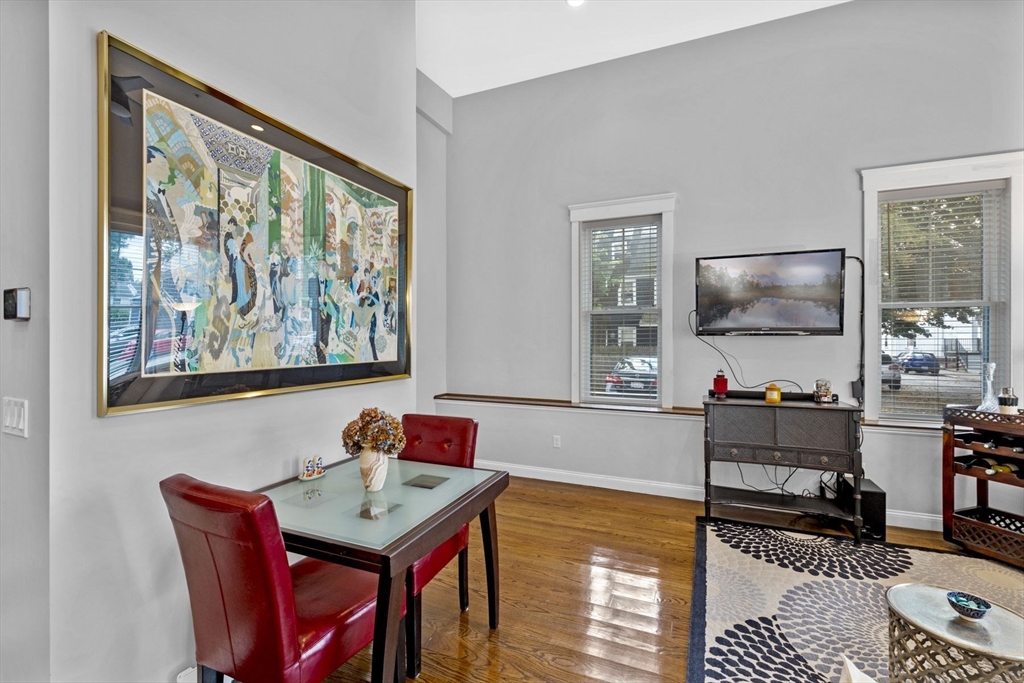 85 Bridge Street, Unit 3 Salem, MA 01970 - Photo 13 of 31 a living room with furniture and a flat screen tv