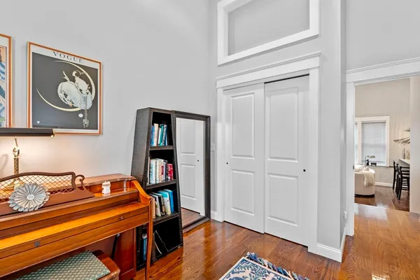 a room with a table and a potted plant