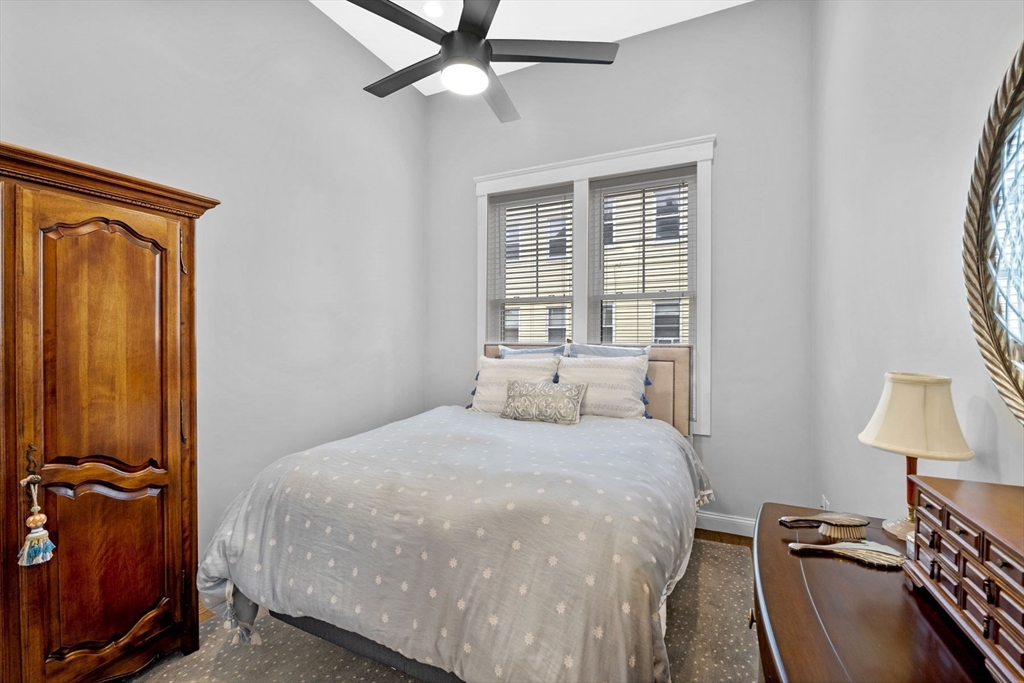 85 Bridge Street, Unit 3 Salem, MA 01970 - Photo 19 of 31 a bedroom with a bed and a window