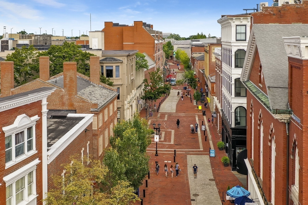 85 Bridge Street, Unit 3 Salem, MA 01970 - Photo 25 of 31 an aerial view of a residential apartment building with a yard