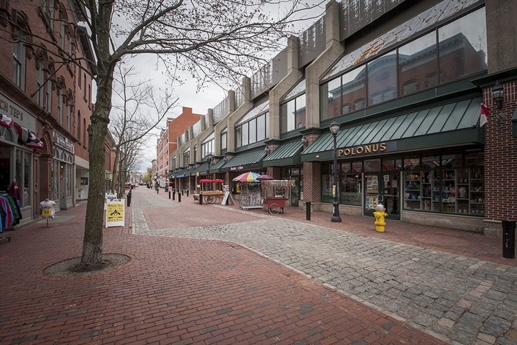 85 Bridge Street, Unit 3 Salem, MA 01970 - Photo 26 of 31 a view of street with shops on a patio