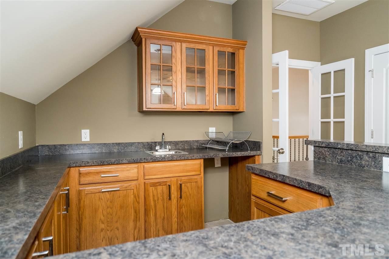 412 Hillcrest Road Apex, NC 27502 - Photo 26 of 30 Additional space for a beverage fridge and ice maker!