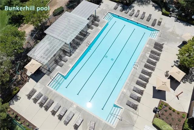 a room with water heater and wooden floor