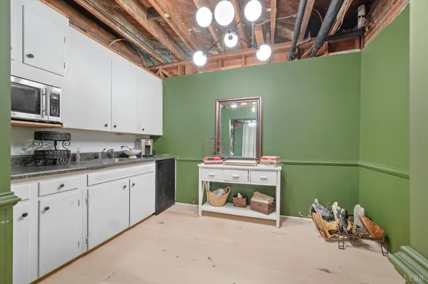 a room with furniture and a fireplace