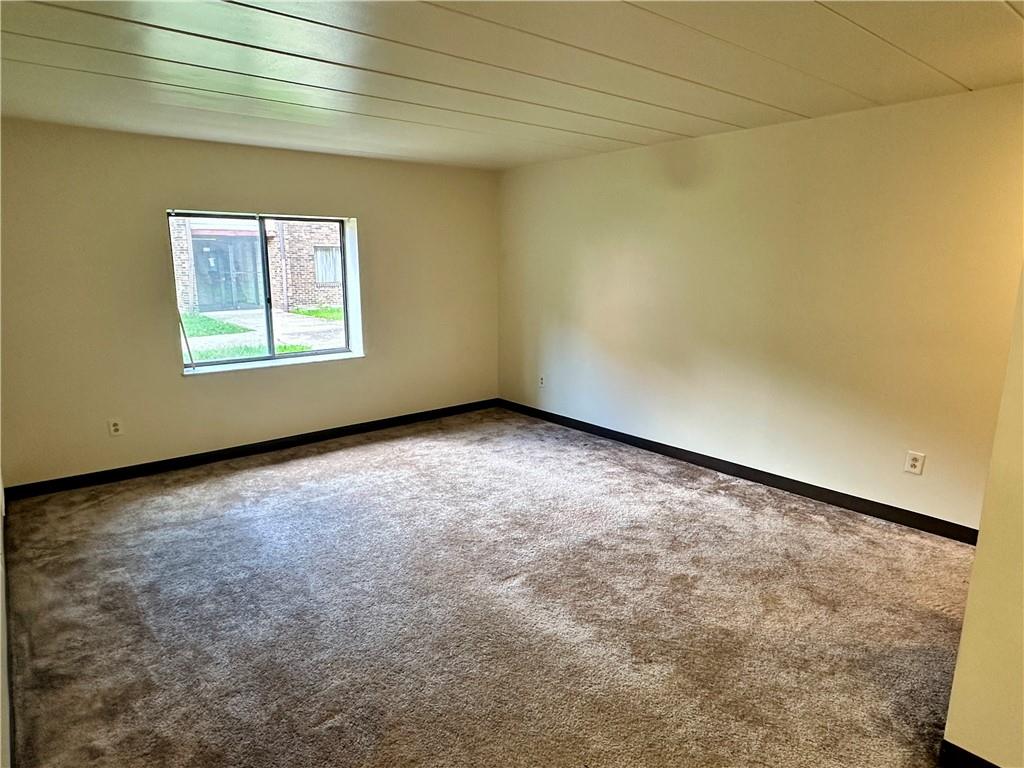 200 Electric Avenue, Unit A8 East Pittsburgh, PA 15112 - Photo 3 of 10 an empty room with a window