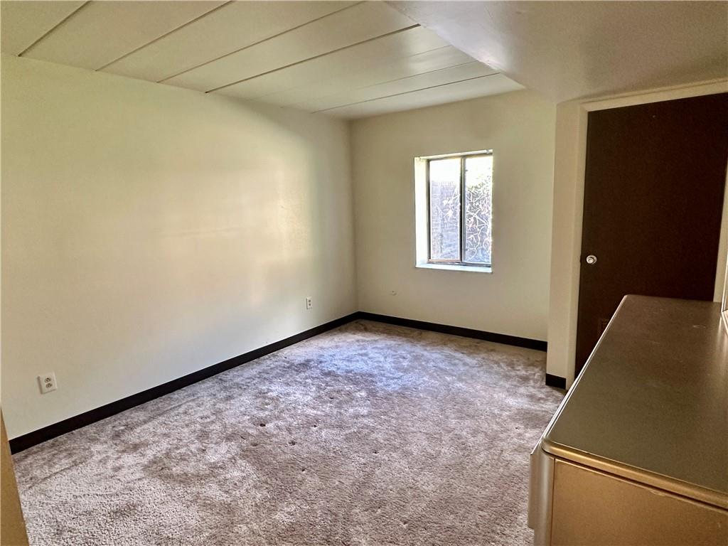 200 Electric Avenue, Unit A8 East Pittsburgh, PA 15112 - Photo 5 of 10 a view of an empty room and window
