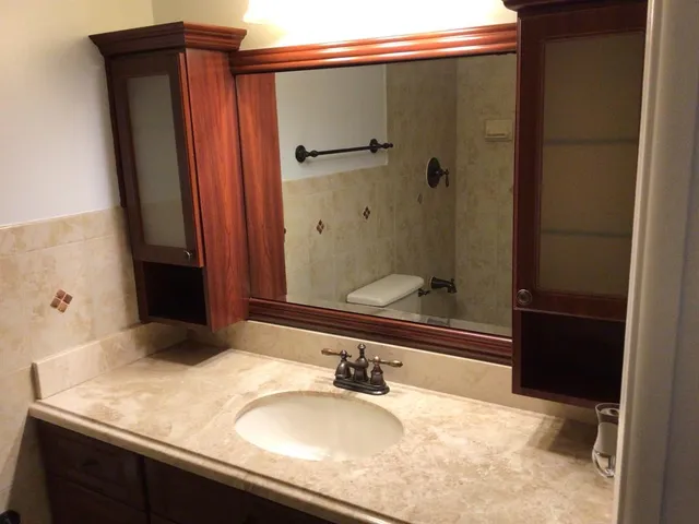 a view of balcony with furniture