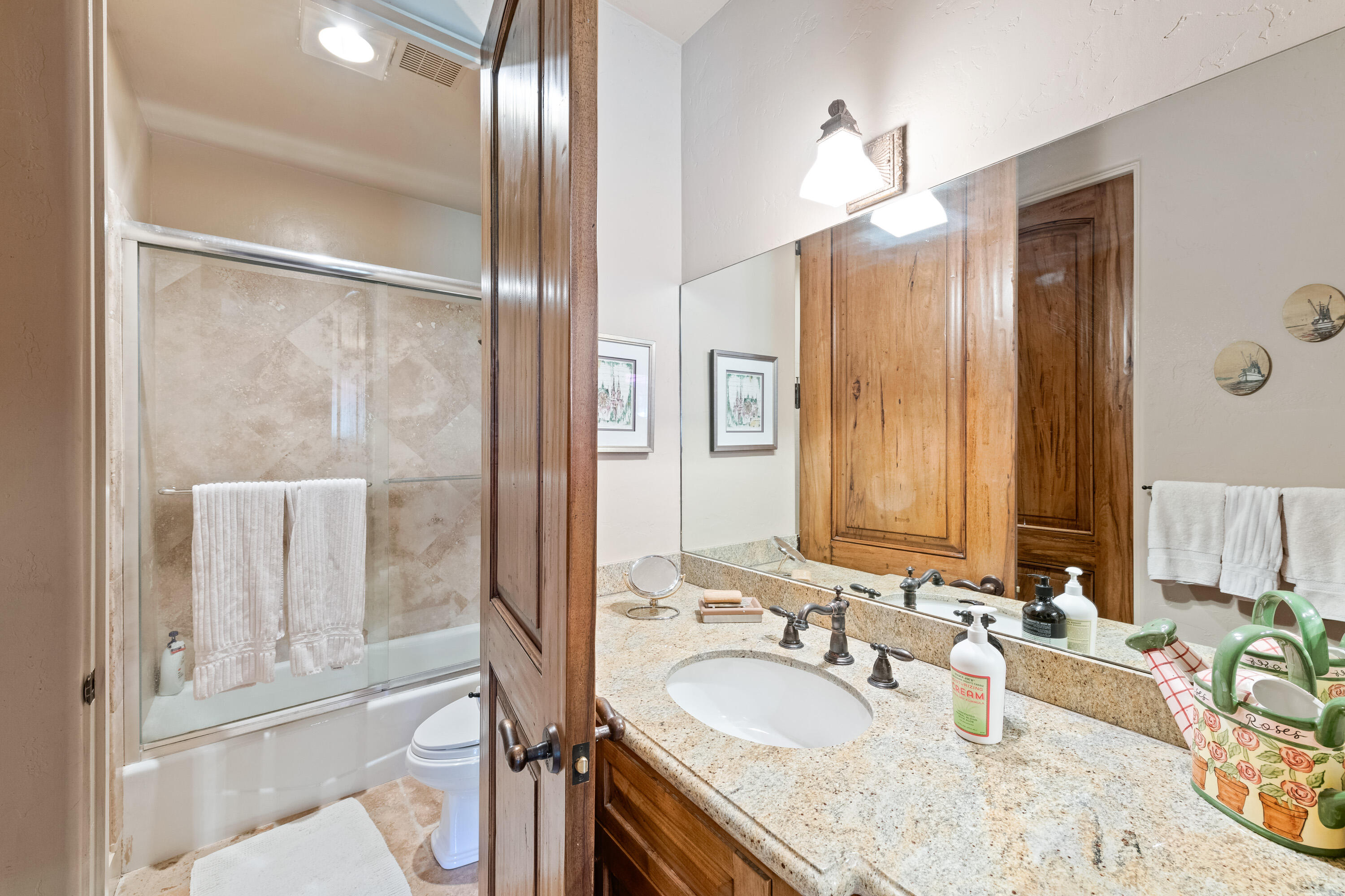 59985 Hop Patch Spring Road Mountain Center, CA 92561 - Photo 26 of 63 a bathroom with a granite countertop double vanity sink and mirror