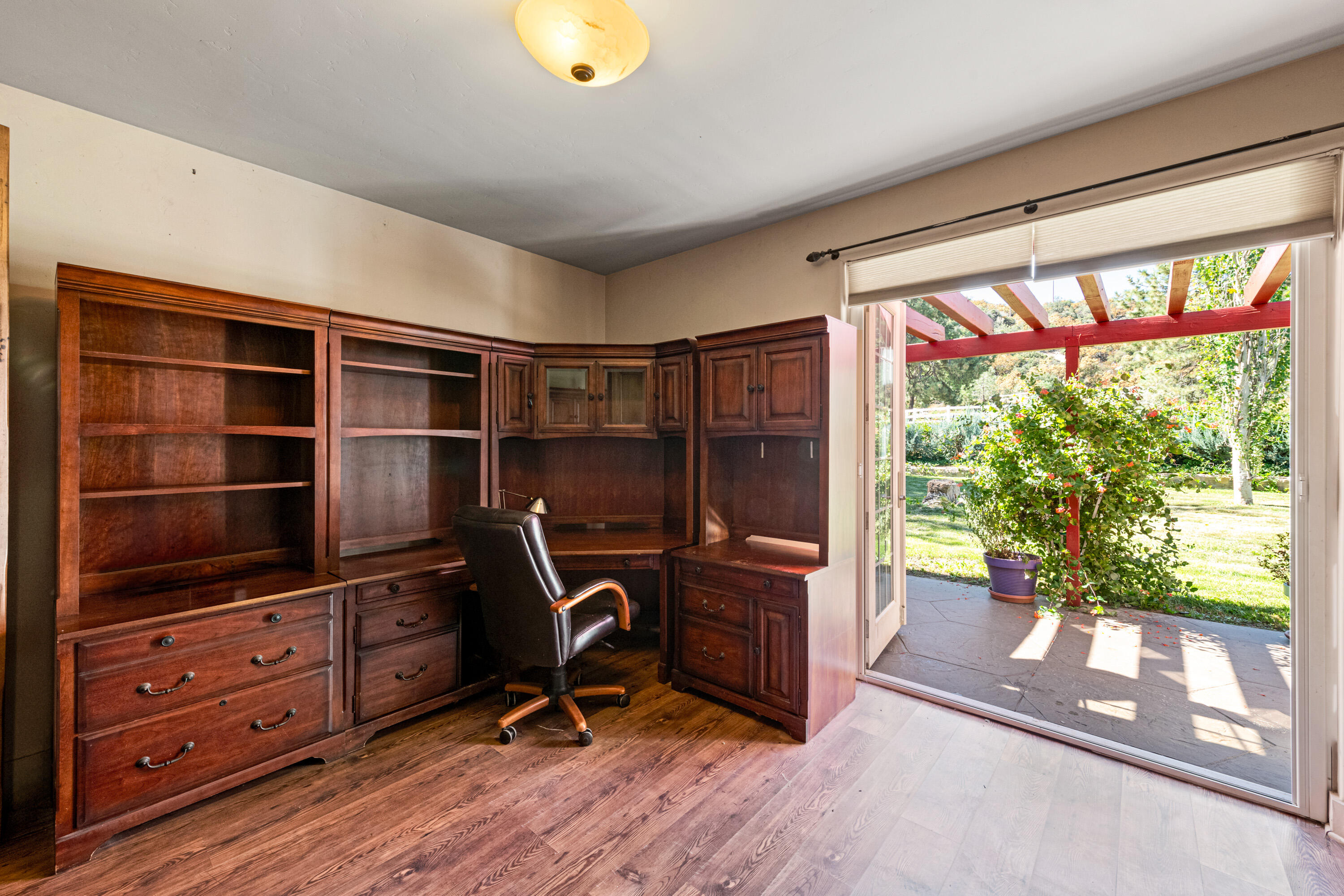 59985 Hop Patch Spring Road Mountain Center, CA 92561 - Photo 27 of 63 a view of a workspace with furniture and a window