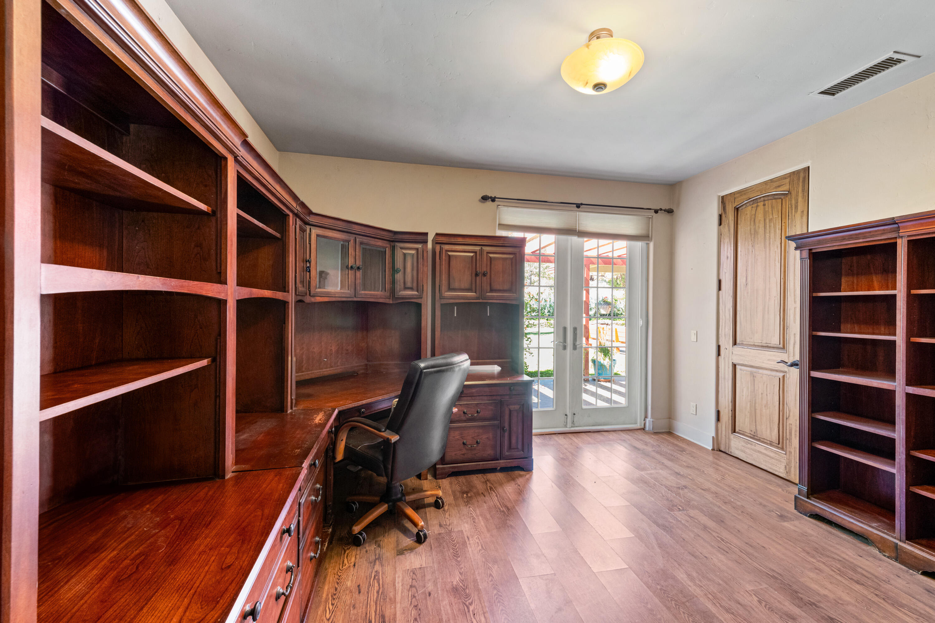 59985 Hop Patch Spring Road Mountain Center, CA 92561 - Photo 29 of 63 a view of a room with wooden floor and furniture