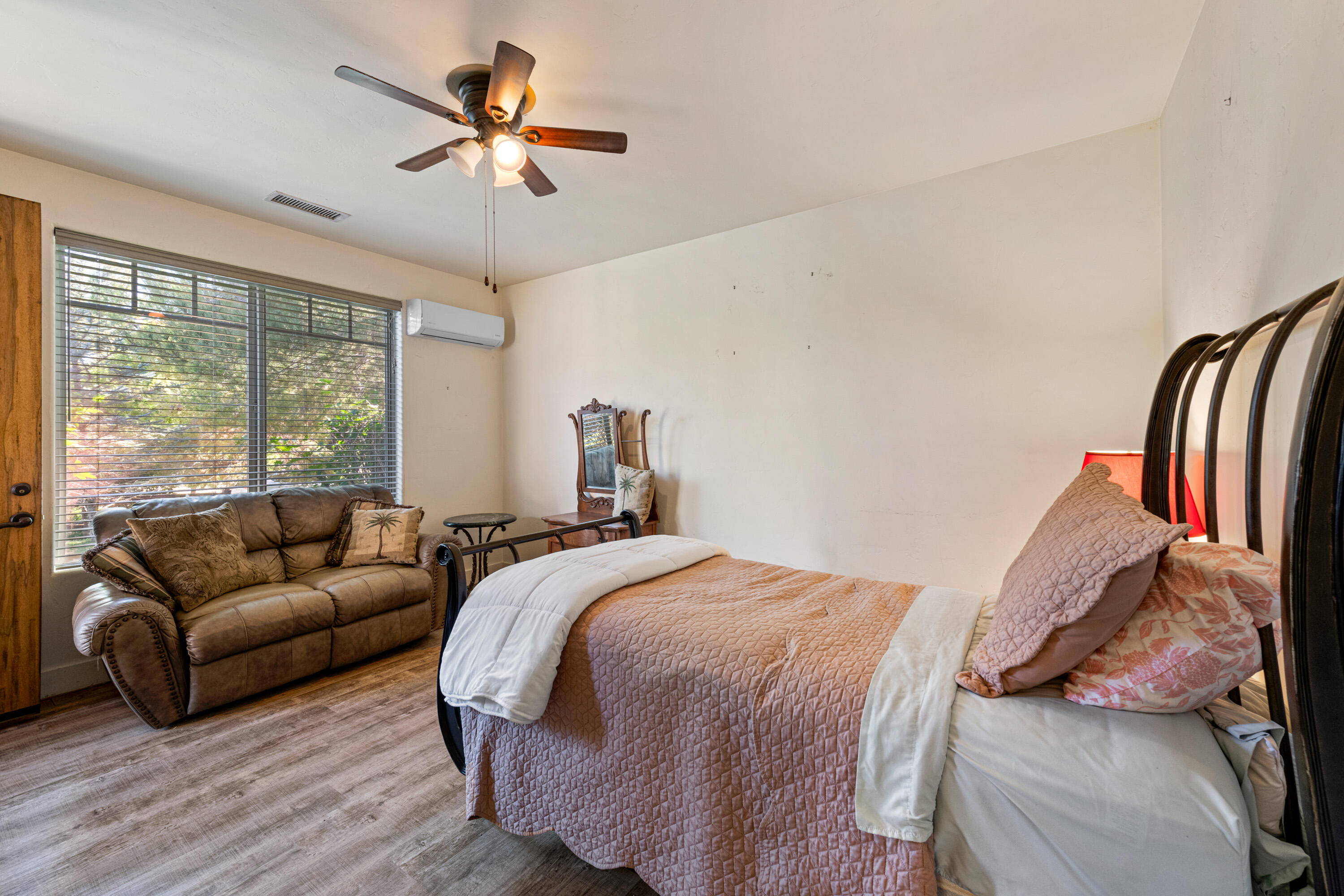 59985 Hop Patch Spring Road Mountain Center, CA 92561 - Photo 33 of 63 a bedroom with a bed and a large window