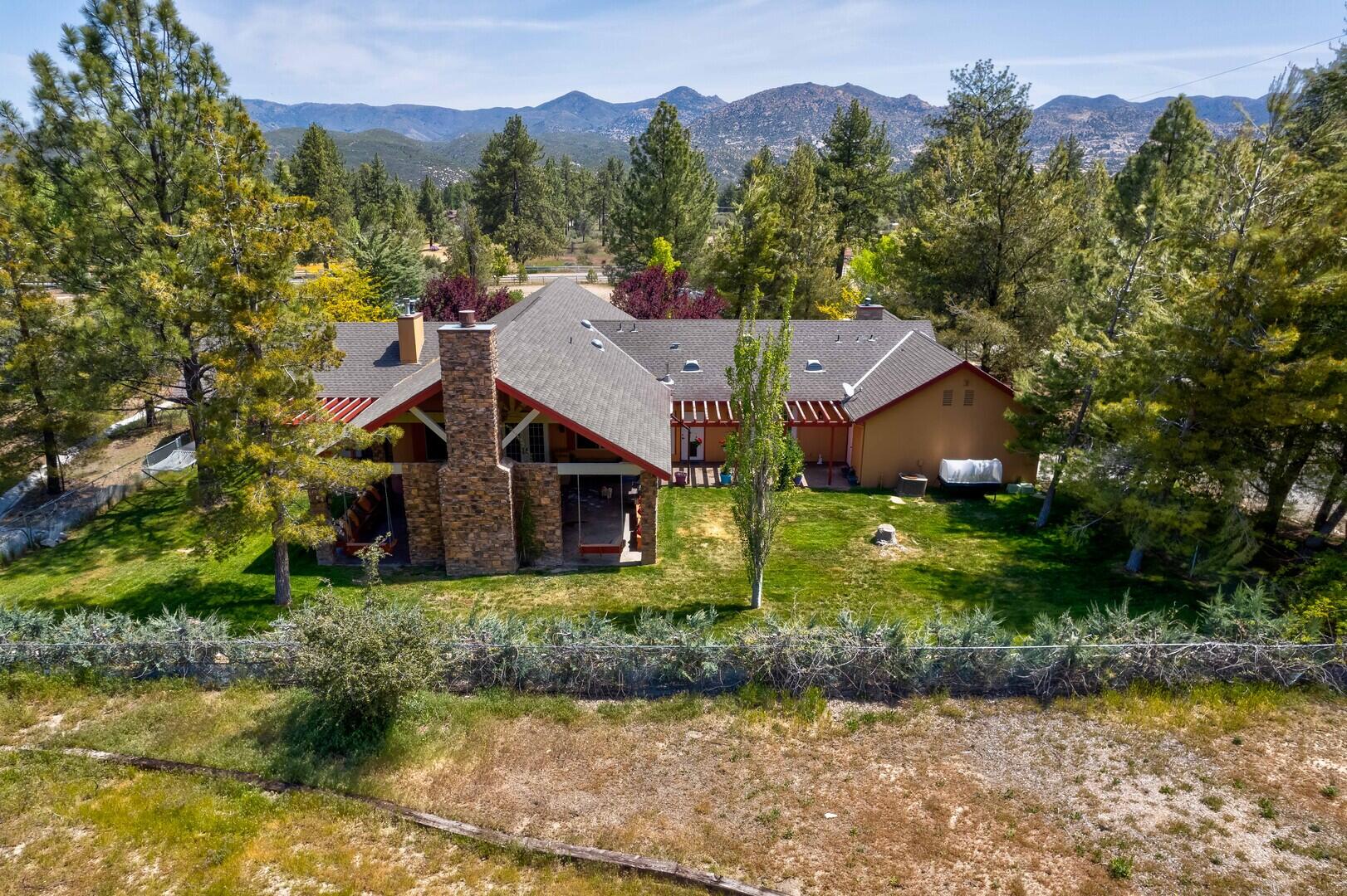 59985 Hop Patch Spring Road Mountain Center, CA 92561 - Photo 44 of 63 a aerial view of a house