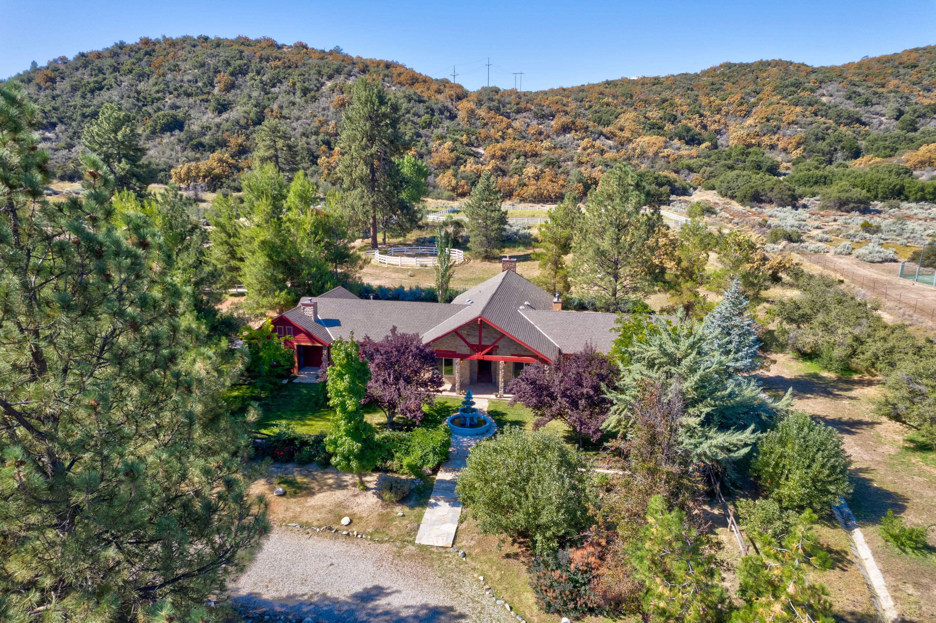 59985 Hop Patch Spring Road Mountain Center, CA 92561 - Photo 58 of 63 an aerial view of house with yard and mountain view in back