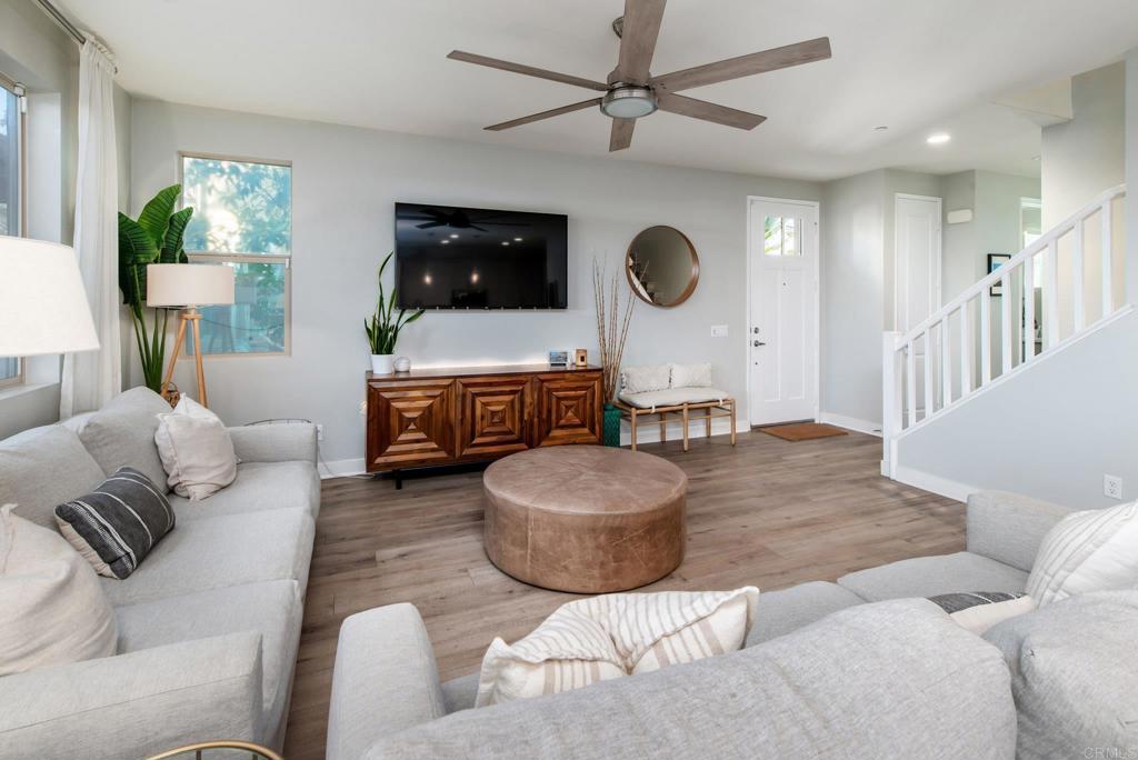 1244 Via Candelas Oceanside, CA 92056 - Photo 24 of 60 a living room with furniture and a flat screen tv