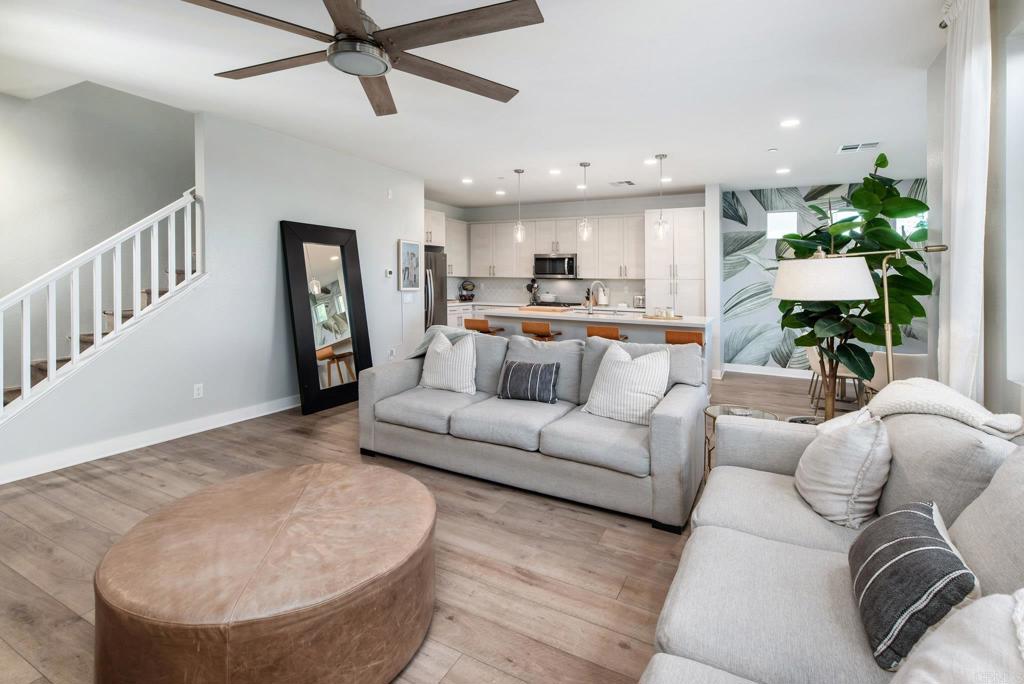 1244 Via Candelas Oceanside, CA 92056 - Photo 27 of 60 a living room with furniture and a dining table