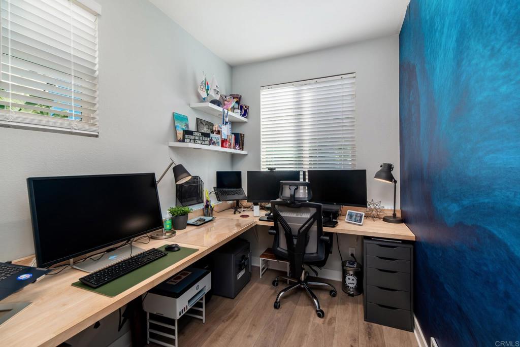 1244 Via Candelas Oceanside, CA 92056 - Photo 33 of 60 a view of a workspace with furniture and a window