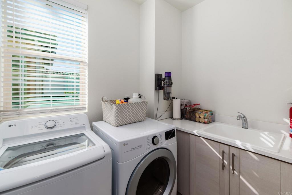 1244 Via Candelas Oceanside, CA 92056 - Photo 41 of 60 a utility room with dryer and washer