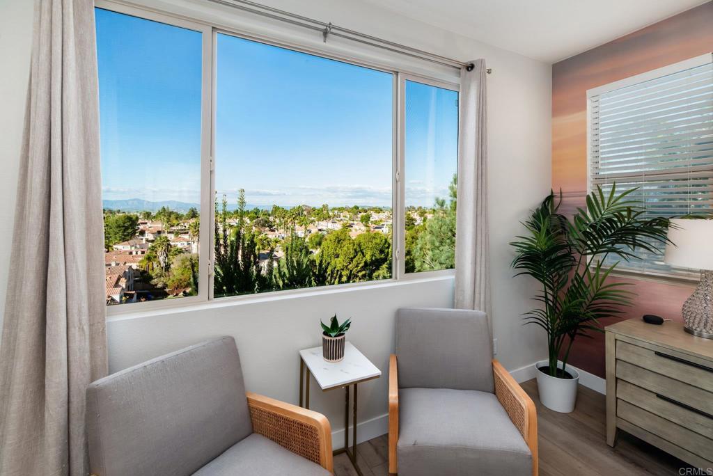 1244 Via Candelas Oceanside, CA 92056 - Photo 47 of 60 a living room with furniture and a large window