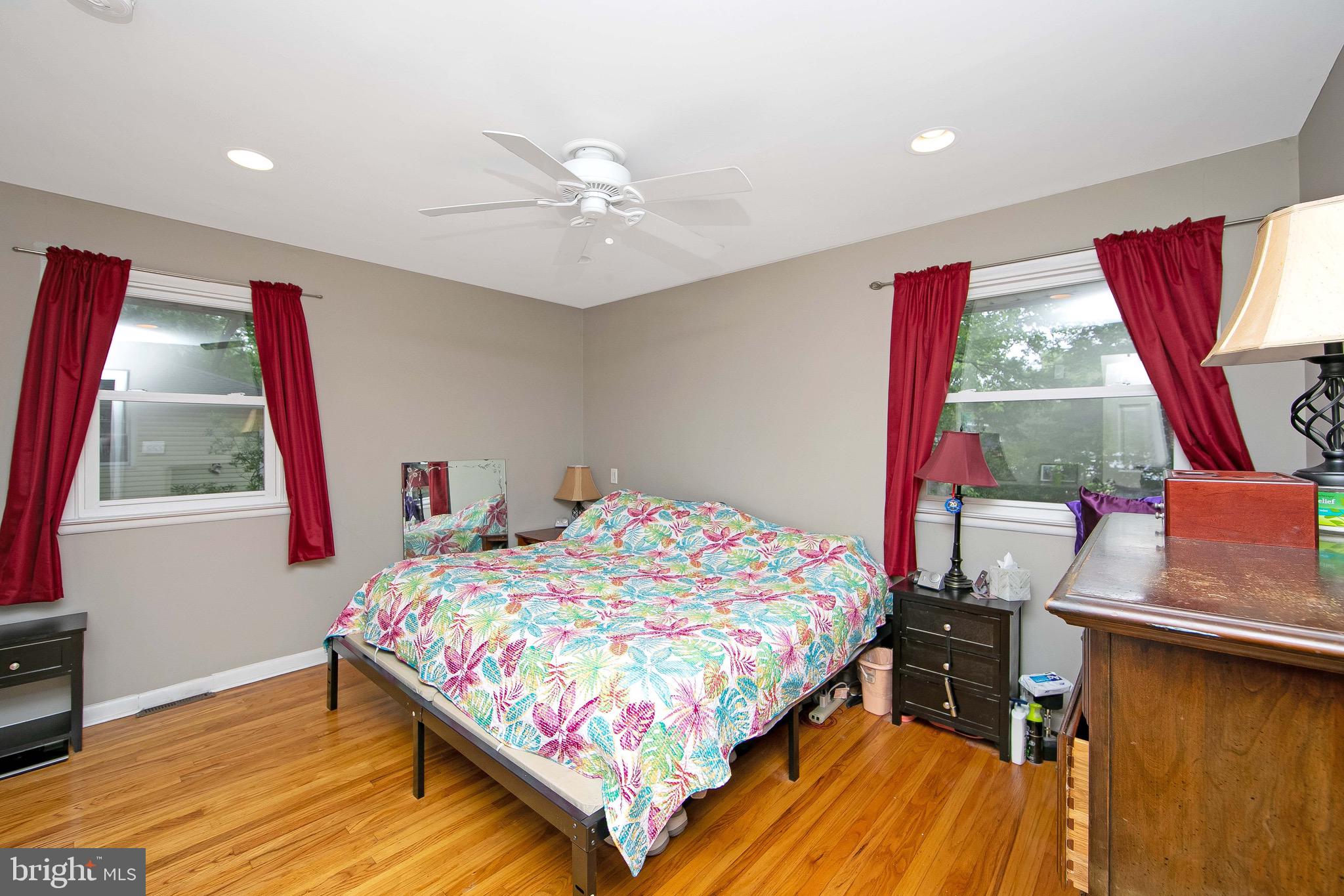 421 Yorkshire Road Cherry Hill, NJ 08034 - Photo 13 of 38 a bedroom with a bed and a window