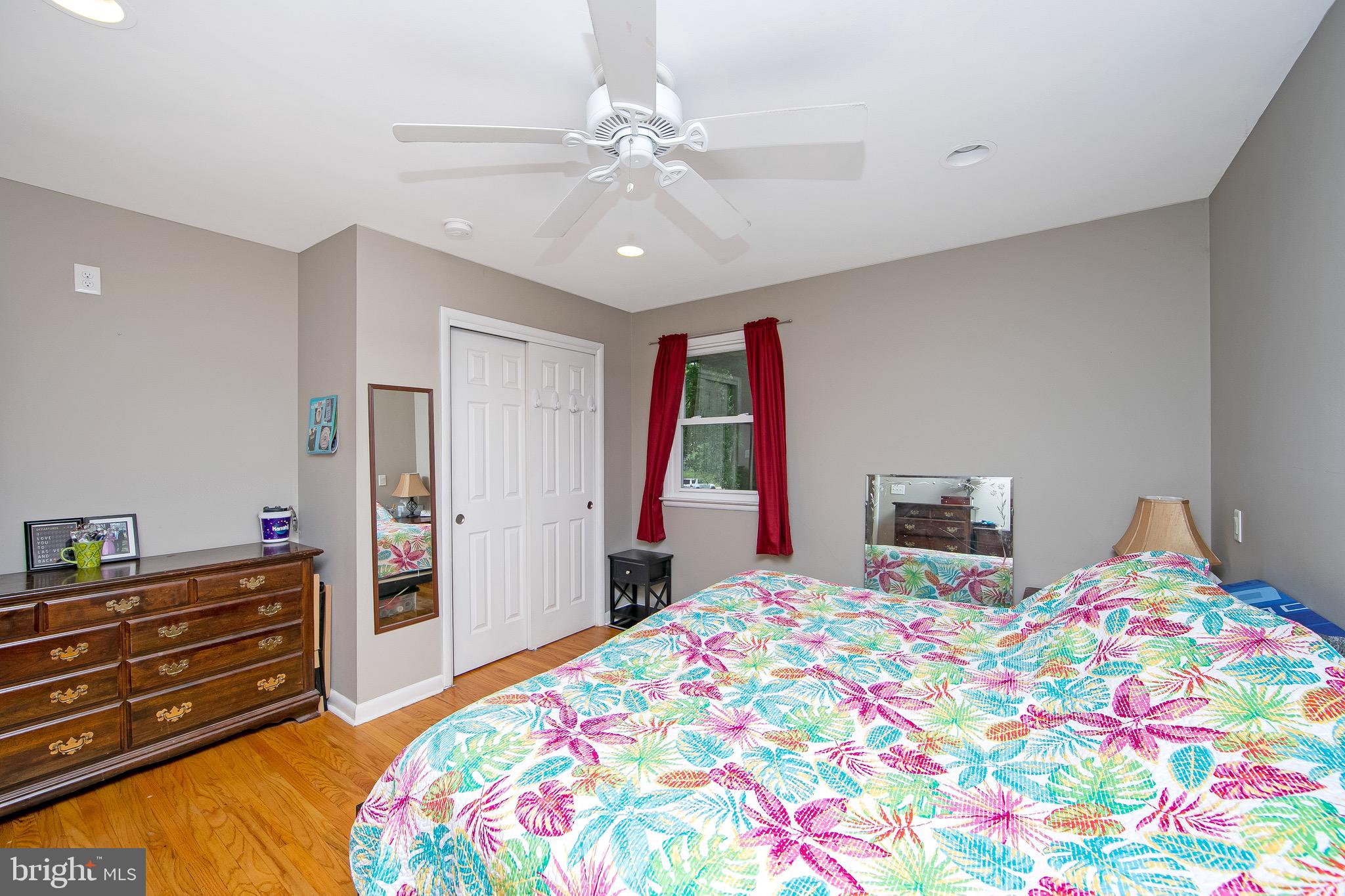 421 Yorkshire Road Cherry Hill, NJ 08034 - Photo 14 of 38 a bedroom with a bed and a dresser in it