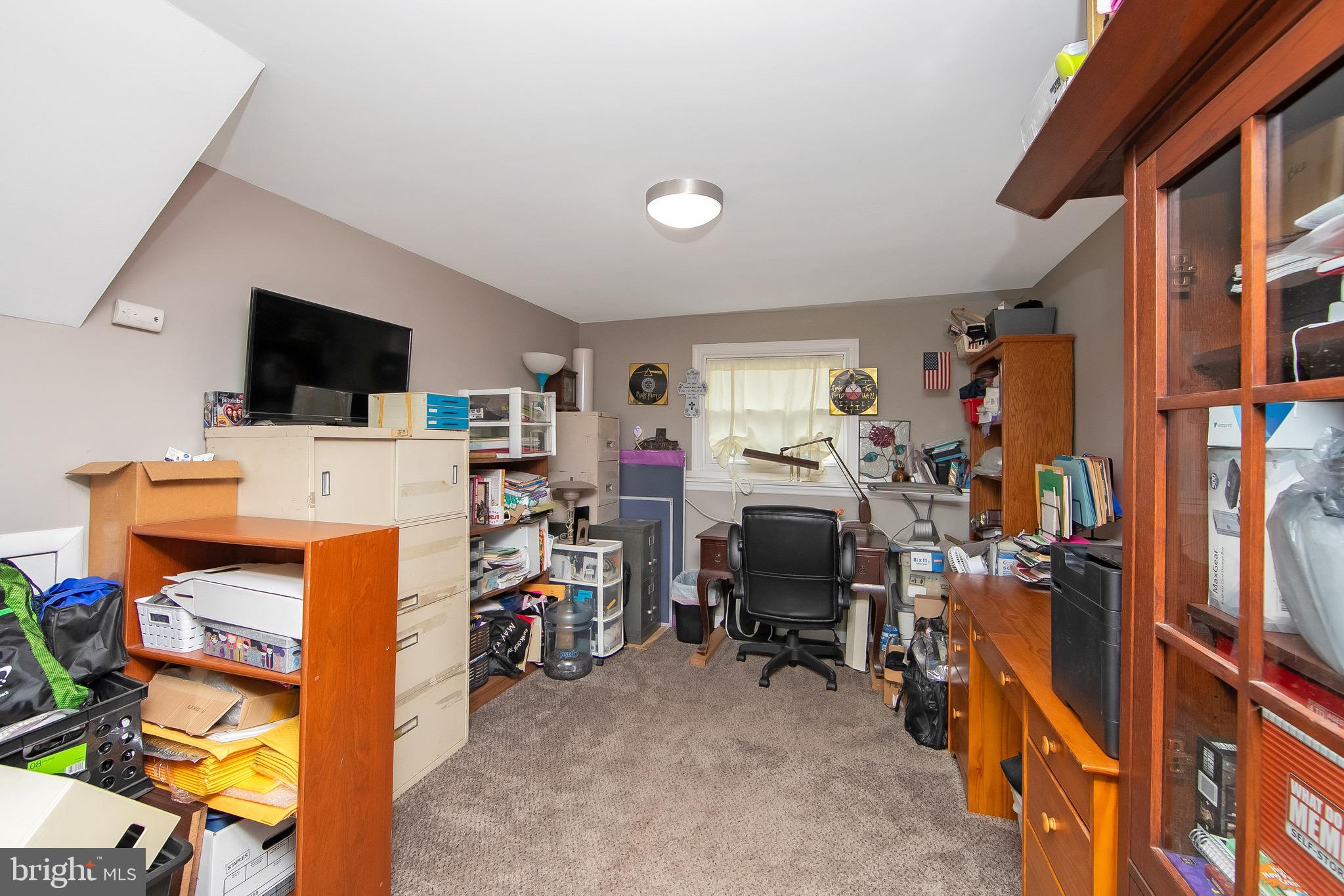 421 Yorkshire Road Cherry Hill, NJ 08034 - Photo 23 of 38 a view of a livingroom with workspace and a window