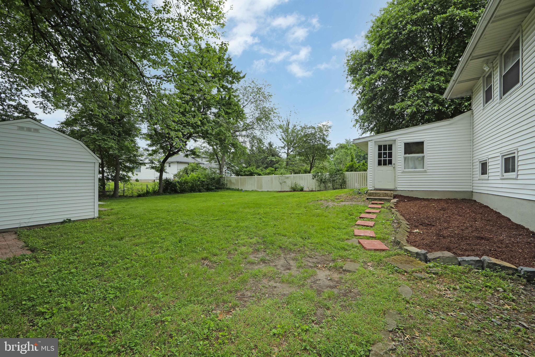 421 Yorkshire Road Cherry Hill, NJ 08034 - Photo 34 of 38 a view of a backyard with a garden