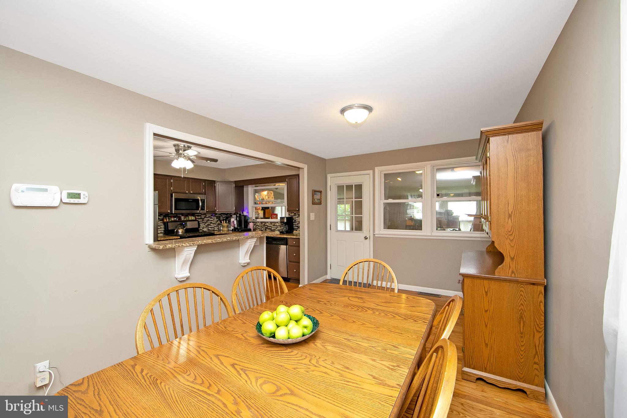 421 Yorkshire Road Cherry Hill, NJ 08034 - Photo 6 of 38 a living room with furniture and a wooden floor